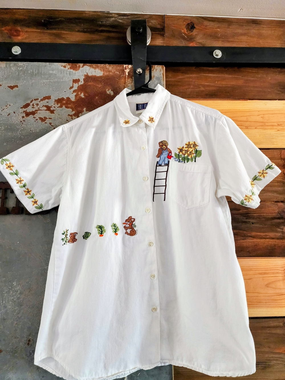 Vintage Bill Blass White Embroidered Floral & Character Top.